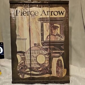 Vintage Pierce Arrow Car Advertisement On Rustic Wood